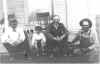 Four_men_on_porch.jpg (62741 bytes)